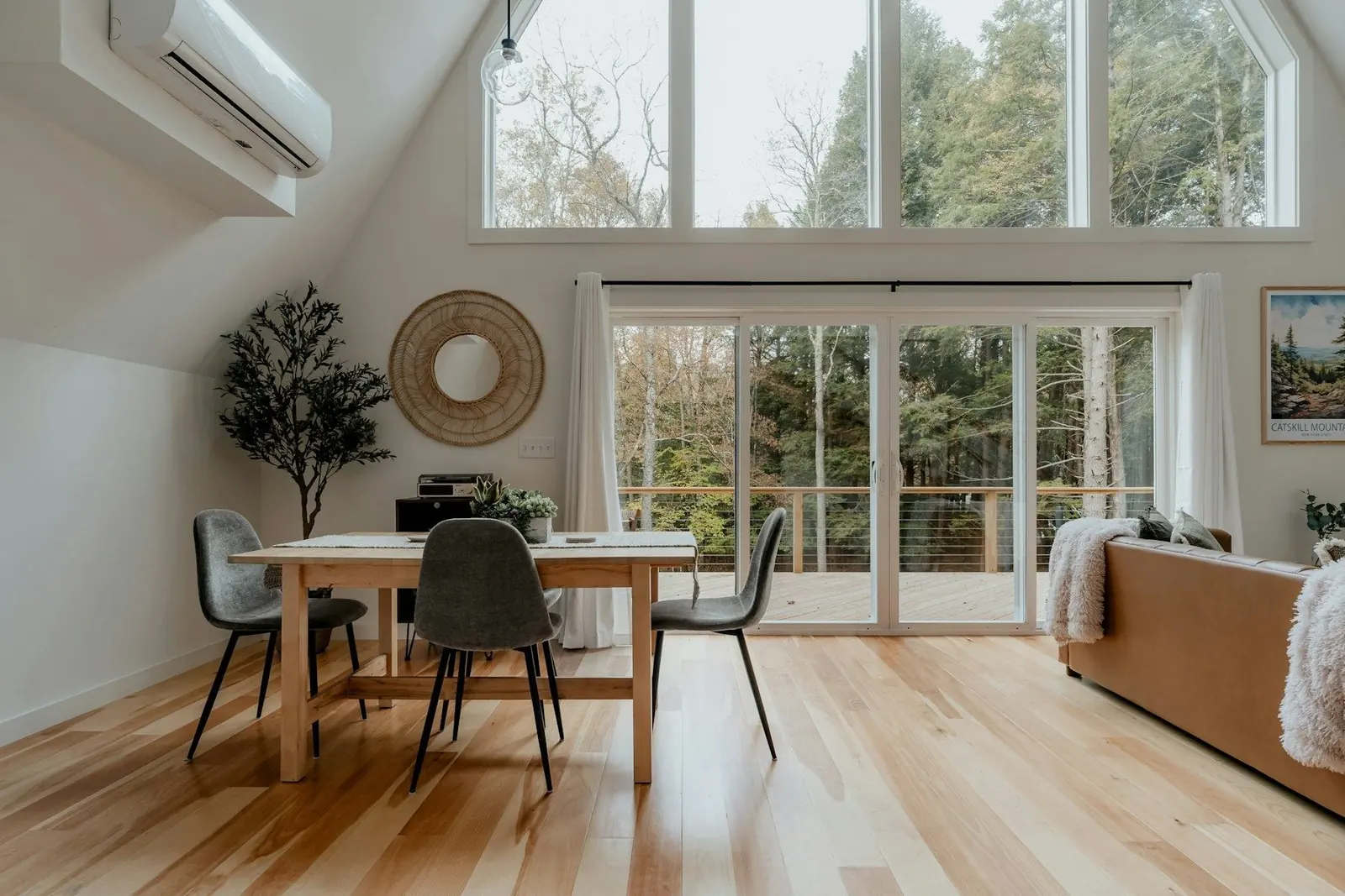 Bright dining room with light hardwood floors