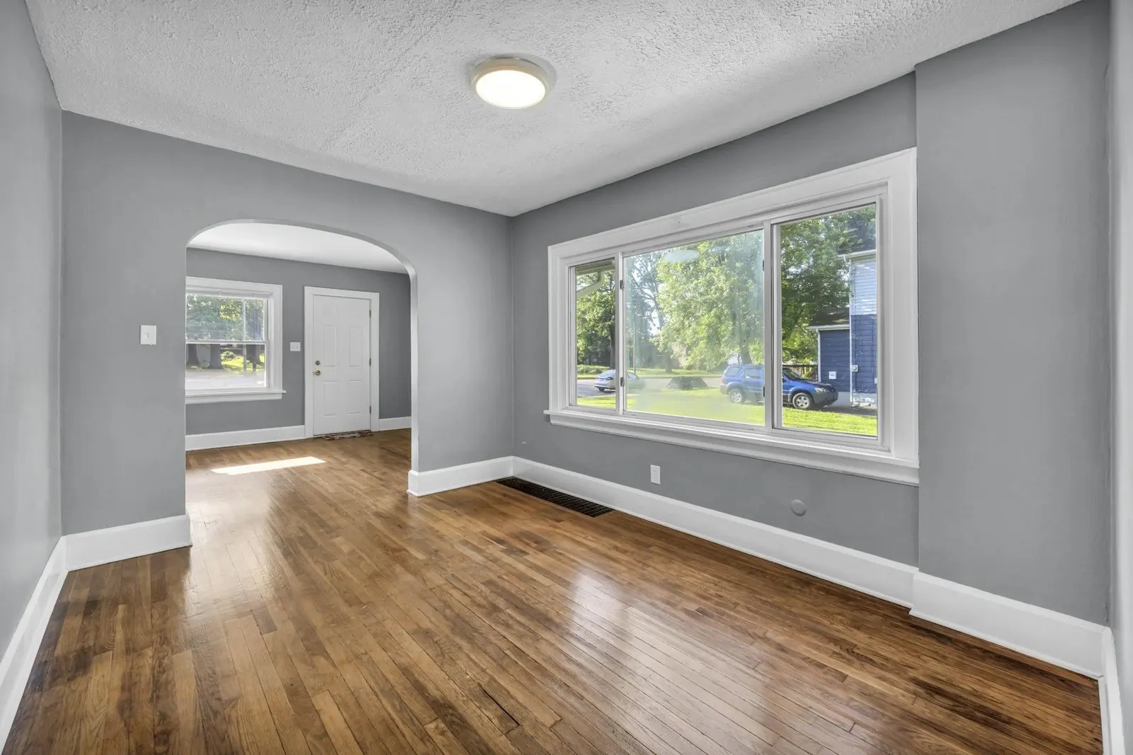 Classic hardwood, bright bedroom